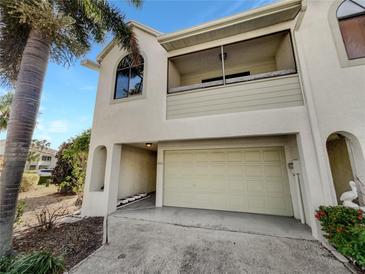 Two-story condo with attached garage and balcony at 2364 Hanover Dr, Dunedin, FL 34698