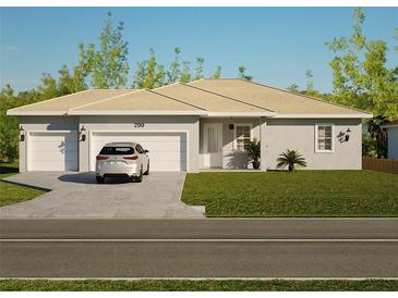 Single-story home with two-car garage and landscaped lawn at 49 Mark Twain Ln, Rotonda West, FL 33947