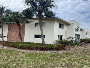 This beautiful multi-Gathering home features palm trees and manicured landscaping at 4480 Overlook Dr Ne Dr # 17, St Petersburg, FL 33703