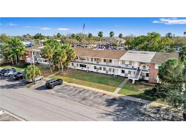 Inviting condo complex featuring well-maintained landscaping, on-site parking, and easy access to local amenities at 2353 Shelley St # 21, Clearwater, FL 33765