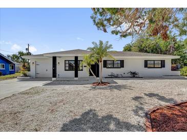 Charming single-story home with a well-maintained front yard and inviting curb appeal at 1154 64Th S Ave, St Petersburg, FL 33705