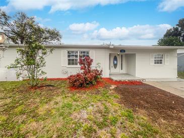 Charming single-story home featuring a well-maintained lawn, fresh exterior paint and beautiful curb appeal at 4800 86Th N Ave, Pinellas Park, FL 33782