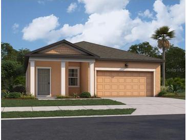 Charming single-story home with a two car garage, manicured lawn, and welcoming front entry at 14725 Italy Ave, Dade City, FL 33523