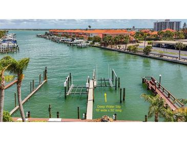 View of the waterfront featuring a boat slip that is sixteen feet wide and fifty feet long at 1581 Gulf Blvd # 102N, Clearwater Beach, FL 33767