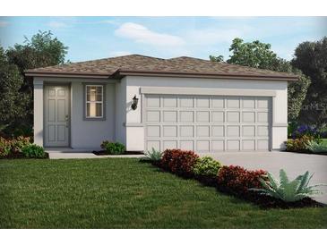 Charming single-story home featuring an attached two-car garage and well-maintained landscaping at 14106 Crutchfield Ct, Parrish, FL 34219