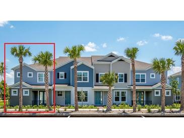 Charming townhome featuring a landscaped entrance, multiple stories, and a modern architectural design at 17378 Alderwood Ln, Punta Gorda, FL 33982