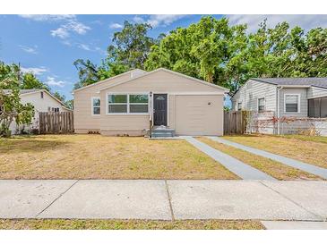 Charming single-story home with a well-maintained lawn and concrete driveway at 3944 11Th S Ave, St Petersburg, FL 33711