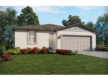 Charming single-story home with neutral stucco, a two-car garage, and colorful landscaping at 31660 Wild Grape Ln, Brooksville, FL 34602