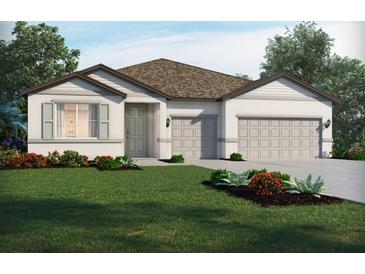 Inviting single-Gathering home with a well-manicured lawn and a two-car garage at 1799 Draughton Dr, Zephyrhills, FL 33541