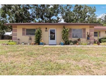 Charming one-story home with beautiful flower beds and manicured lawn at 4549 Tippecanoe Trl # 20, Sarasota, FL 34233
