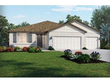 Charming one-story home with a manicured lawn, a two-car garage, and neutral color palette at 1806 Draughton Dr, Zephyrhills, FL 33541