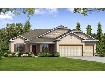 Charming one-story home with a manicured lawn and a two-car garage at 3441 Gramercy Ln, Spring Hill, FL 34609