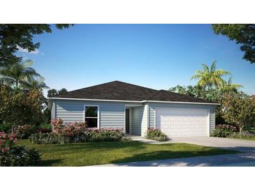 Charming single-story home with a well-manicured lawn and attached two-car garage at 14037 Canada Goose Rd, Brooksville, FL 34614