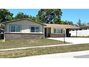 Charming single-story home with a well-maintained lawn and inviting curb appeal at 4469 Keyes Ave, Spring Hill, FL 34606