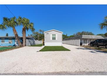Charming single-story home featuring low maintenance yard and newer siding at 13024 Dania St, Hudson, FL 34667