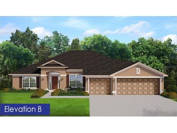 Charming single-story home with a three-car garage, manicured lawn, and beautiful landscaping at 13144 Convent Garden Rd, Brooksville, FL 34613