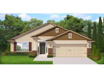 Inviting single-Gathering home with a two-car garage, lush lawn, and decorative stone accents at 13197 Gulf Bay Ln, Spring Hill, FL 34609