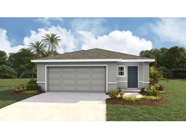 Charming single-story home with a gray exterior, attached two-car garage and a well-manicured lawn at 11745 Memorial Dr, Brooksville, FL 34613