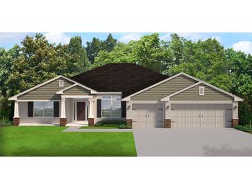 Charming single-story home with neutral siding, two-car garage, well-maintained lawn, and inviting front entrance at 12142 Pine Warbler Ave, Brooksville, FL 34614