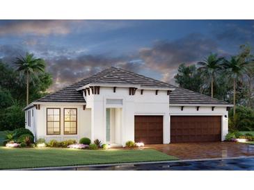 Two-story home with two-car garage and landscaping at 4605 Sweet Retreat Run, Bradenton, FL 34211