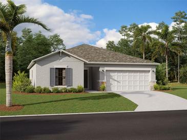 Charming single-story home with a well-manicured lawn and an attached two-car garage, complemented by lush landscaping at 9910 Last Light Gln, Parrish, FL 34219