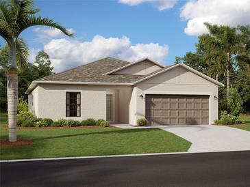 Beautiful single-story home featuring a two-car garage and a well-manicured lawn and landscaping at 9864 Last Light Gln, Parrish, FL 34219