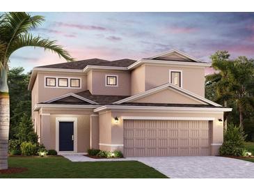 Charming two-story home with a neatly manicured lawn, a two car garage, and tropical landscaping at 16842 Fiesta Dr, Port Charlotte, FL 33953