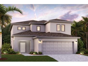 Two-story home featuring a modern design, a neutral color palette, an attached two-car garage, and manicured landscaping at 16836 Fiesta Dr, Port Charlotte, FL 33953