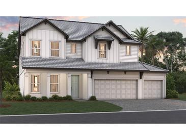 Charming two-story home with white siding, gray roof, three-car garage, and well-maintained landscaping at 7562 Seahawk Ave, Sarasota, FL 34241