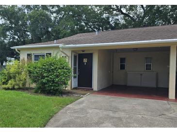 Cozy condo with carport and well-maintained lawn at 390 301 W Blvd # 8 D, Bradenton, FL 34205