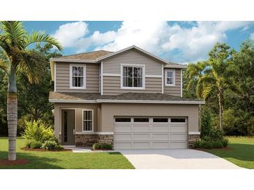 Charming two-story home with a two-car garage and inviting curb appeal at 6058 Jensen View Ave, Apollo Beach, FL 33572