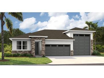 Inviting single-story home with a two-car garage and attractive stone and siding facade, perfect for modern living at 9058 Players Dr, Weeki Wachee, FL 34613