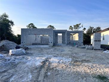 New construction featuring concrete walls and rough grading, ready for customization in a promising neighborhood at 122 Naomi Pl, Rotonda West, FL 33947