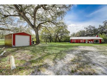 Photo one of 37414 Woodriver Dr Dade City FL 33523 | MLS T3507663