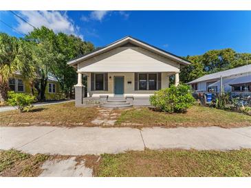 Quaint craftsman bungalow with a charming front porch at 1514 E 26Th Ave, Tampa, FL 33605