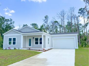 Modern single story home with attached garage at 17423 Metcalf Ave, Port Charlotte, FL 33954