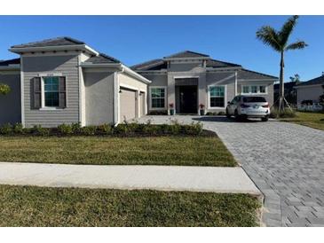 Photo one of 17310 Opal Sand Dr Venice FL 34293 | MLS T3520032