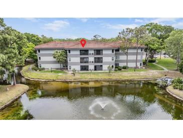 Photo one of 2650 Countryside Blvd # C305 Clearwater FL 33761 | MLS T3523165