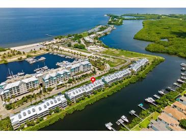 Aerial view of waterfront property and community at 549 Bahia Beach Blvd, Ruskin, FL 33570