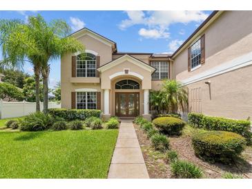 Two-story house with columns and landscaping at 212 Excalibur Ct, Brandon, FL 33511