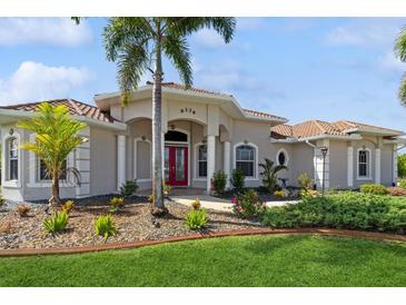 Beautiful home with curb appeal and landscaping at 9336 Melody Cir, Port Charlotte, FL 33981