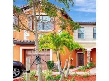 Beautiful two-story townhome exterior at 20294 Lagente Cir, Venice, FL 34293