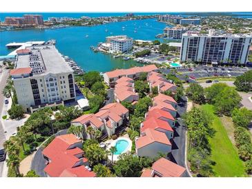 Aerial view of community, showing building arrangement and waterfront access at 240 Windward Psge # 605, Clearwater Beach, FL 33767