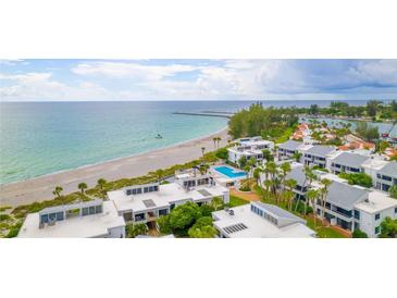 Beachfront community with a pool and ocean views at 1555 Tarpon Center Dr # 136, Venice, FL 34285