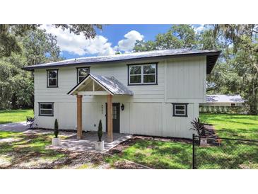 Charming two-story home with covered entryway at 6902 E 29Th Ave, Tampa, FL 33619