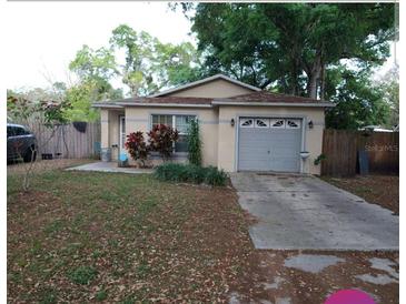 Charming single story home with attached garage and landscaped yard at 4605 N 39Th St # 1/2, Tampa, FL 33610