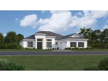 White and gray one-story house with a two car garage at 8514 Shore Lake Dr, Englewood, FL 34224