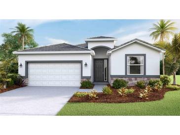 Single story home with attached garage and landscaping at 18014 Tavernside Trl, Lakewood Ranch, FL 34211