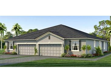 Stunning three-car garage home with a modern design at 18336 Cropside Trl, Lakewood Ranch, FL 34211