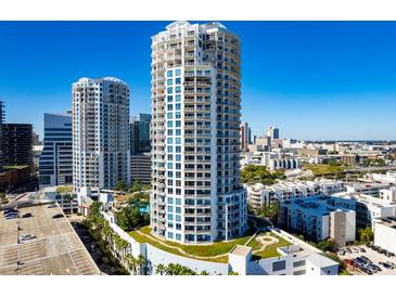 Aerial view of The Towers, showcasing its modern high-rise design and city views at 1209 E Cumberland Ave # 807, Tampa, FL 33602